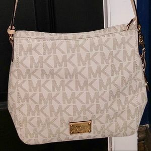 Michael Kors cross-body purse.